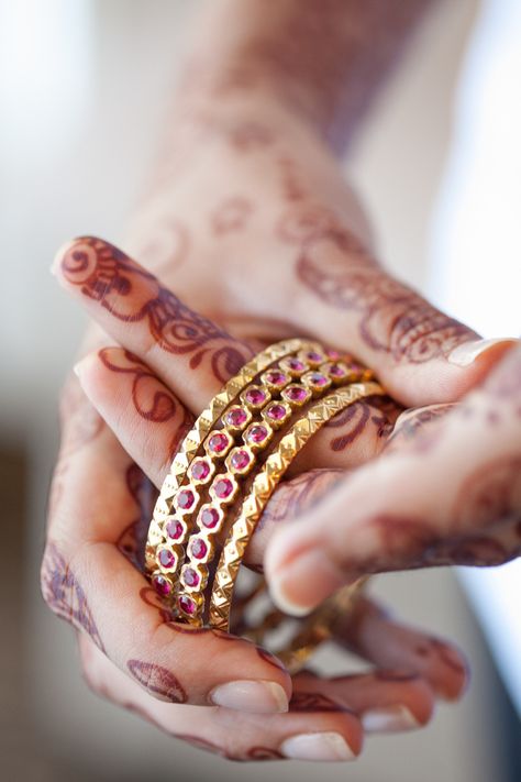 Photography: Sabine Scherer Photography - www.sabinescherer.com  Read More: http://www.stylemepretty.com/2014/08/06/indian-summer-outdoor-wedding/ Gold Bangles Indian, Stone Bangles, Ruby Bangles, Bangles Gold, Summer Wedding Outdoor, Arm Jewelry, Wedding Jewellery Collection, Stone Bangle, Bangles Jewelry Designs