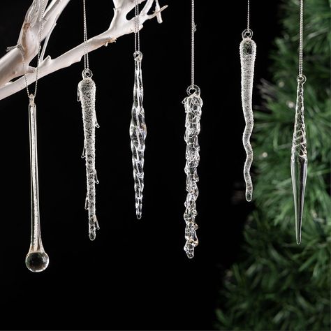 PRICES MAY VARY. 🎅【HIGH QUALITY GLASS】：These handmade and mouth-blown icicles are made of eco-friendly and recyclable glass. beautiful and crystal clear that you can reuse them on next Christmas or other important days. 🎅【BEAUTIFUL DESIGN】：Crystal clear icicle ornaments have 6 styles, each style 6pcs. every icicle is very lifelike, beautiful appearance and vivid details that just like the real icicle, You can use them to create a romantic and unique holiday atmosphere easily, definitely a perf