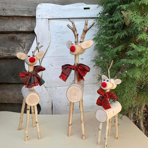 Family log reindeer Holiday Centerpiece Christmas Gift rustic reindeer   Large - body length 11 inches, height with horns 32 inches. Medium - length 9 inches, height with horns 24 inches. Small, length - 7 inches, height with horns 16 inches. Mother roe deer with children - that's what this family can be called. If you need father -log reindeer, you can find it by following the link   https://www.etsy.com/shop/MagicbirchShop?ref=seller-platform-mcnav&section_id=31143625   ntroducing our captivating Birch Tree Reindeer figurine, a whimsical addition to your holiday decor collection. Handcrafted with meticulous attention to detail, this enchanting piece showcases a majestic reindeer surrounded by a serene birch tree forest. Skillfully carved from natural birch wood, each reindeer boasts a li Wooden Log Reindeer, Wood Log Christmas Decor, Homemade Wooden Christmas Gifts, Birch Reindeer, Reindeer Logs, Reindeer Decorations Christmas, Log Decorations, Birch Crafts, Log Reindeer