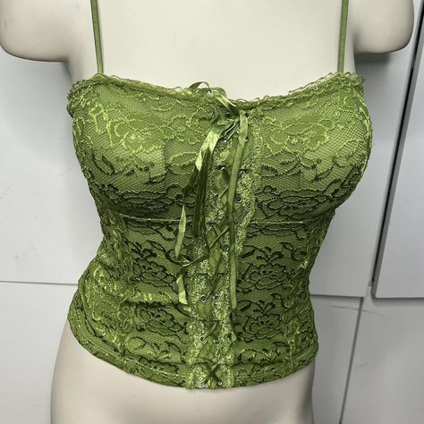 Brand  New
green stretchy corset style top
y2k dance... - Depop Y2k Grunge Fairy, Green Lace Top, Corset And Skirt, Green Corset, Corset Style Tops, Grunge Fairy, Dance Tops, New Green, Corset Style