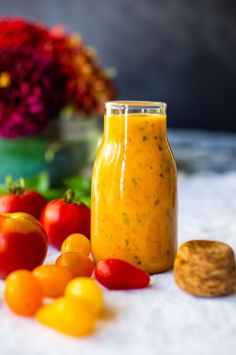 This summery recipe for Tomato Vinaigrette is delicious on salads, or spooned over fish or chicken, or even used as a marinade for grilling!  #tomatovinaigrette Tomato Vinaigrette, Salad Dressing Bottles, Feasting At Home, Grilled Scallops, Melon Salad, Roasted Tomato Sauce, Leafy Green Salads, Vinaigrette Recipe, Summer Foods