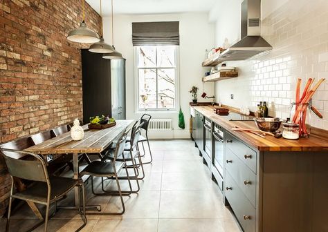 Long, narrow dining table for a galley kitchen. It can be pushed against wall when not in use & even better with bench seating on the wall side. Industrial Interior Kitchen, Narrow Dining Tables, Long Narrow Kitchen, Modern Industrial Kitchen, Kitchen Loft, Industri Modern, Industrial Kitchen Design, Loft Kitchen, Galley Kitchens