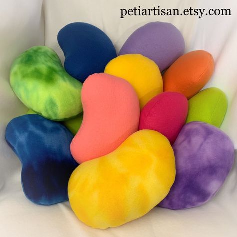 "This listing is for ONE Jelly Bean pillow. Pick your favorite color or make it a set. These pillows can be made in different colors by request. These Jelly Bean pillows are perfect decor for any room! It will brighten your living room, play room, nursery, beach houses, etc. The pillows is handmade from soft fleece and filled with non-allergenic fiberfill.  Size- Small - 10/6\" Large 14\"/8\" All products are handmade by me in a smoke-free environment." Weird Pillows, Candy Room, Candy Pillows, Food Pillows, Cute Furniture, Cute Bedroom Ideas, Shaped Pillow, Scrapbook Book, Knitting Machine Projects