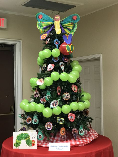 The Very Hungry Caterpillar Christmas Tree School Christmas Tree Theme, Storybook Christmas Decorations, Library Themed Christmas Tree, Storybook Christmas Tree, Work Christmas Tree Themes, Cheap Christmas Tree Decor, Kids Christmas Tree Themes, Library Christmas Tree, Classroom Christmas Tree