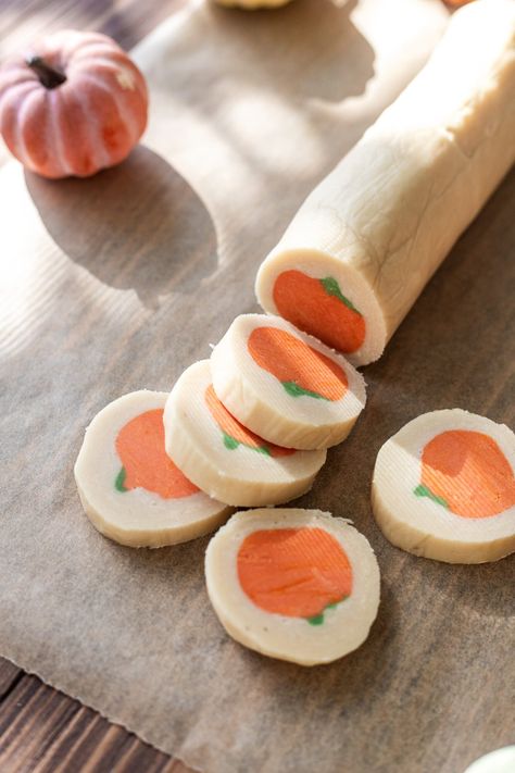 Soft, chewy, and quite literally identical in taste and texture, these copycat Pillsbury pumpkin sugar cookies are made with the simplest slice n' bake cookie dough, and no eggs nor dairy is needed! Diy Pillsbury Halloween Cookies, Pillsberry Pumpkin Cookies, Copycat Pilsbury Pumpkin Sugar Cookies, Copycat Pillsbury Sugar Cookie Dough, Homemade Pillsbury Cookies, Slice And Bake Halloween Cookies, Pillsbury Halloween Cookies Recipe, Pumpkin Sugar Cookies Pillsbury, Pilsbury Pumpkin Cookie