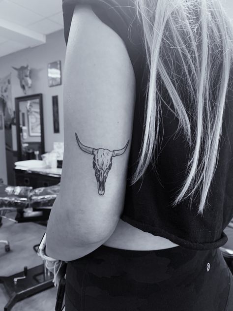 #tattoo #tattooideas #trendy #tattoosforwomen Zach Bryan Bull Tattoo, Cactus Arm Tattoos For Women, Bull Skull Tattoo Back Of Arm, Punchy Tattoos Small, Tattoo Ideas Southern, In Memory Horse Tattoo, Cow Hand Tattoo, Simple Cow Skull Tattoo, Minimal Western Tattoo