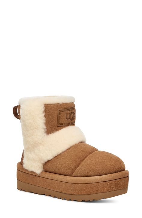 Genuine shearling spill seams and a chunky platform sole bring a fashion-forward look to this updated version of UGG's beloved classic boot. It's lined with UGGplush, a moisture-wicking textile made from a wool-rich blend but crafted to feel and wear like genuine shearling, while the sole is sourced from renewable sugarcane. 1 1/2" platform (size 11) 6 3/4" shaft Water-repellent Leather and genuine shearling upper/UGGplush wool-blend lining/synthetic sole Shearling may be sourced from Australia, Brown Winter Boots, Color Castaño, Ugg Boots Australia, Cold Weather Boots, Latest Fashion Design, Ugg Classic, Classic Boots, Winter Boots Women, Classic Mini