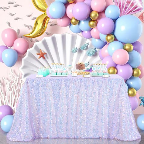 PRICES MAY VARY. Mermaid Party Tablecloth Size:Each package includes 1 packs of purple sequin tablecloth, the size of the Iridescent tablecloth is 52 W by 120 ​L inch. Please measure your table size before purchasing and calculate the proper size for a square or rectangular table.Choose the size based on your table and desired drop length. Sequin Tablecloths Material:The Mermaid Party Tablecloth is crafted from 5MM round sequin material with a mesh fabric backing, adorned with shimmering iridesc Iridescent Tablecloth, Mermaid Baby Shower Theme, Sequin Material, Sequin Tablecloth, Sequin Table, Table Overlays, Mermaid Baby Showers, Party Table Cloth, Glitter Birthday