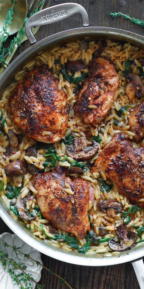 ONE-POT Creamy Chicken Orzo with Spinach and Mushrooms. It's a 30-minute one-pan well-balanced weeknight meal that has everything: protein, veggies, and pasta! Skinless boneless chicken thighs are pan-seared with paprika and Italian seasoning. It's the perfect comfort food that will surely become one of your family's favorite dinners! Orzo With Mushrooms, Creamy Chicken Orzo, Orzo With Spinach, Skinless Boneless Chicken Thighs, Orzo Spinach, Orzo Pasta Recipes, Simple Spinach Salad, Protein Veggies, Mushrooms And Spinach