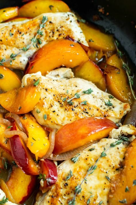 Bourbon peach chicken is a vibrant, colorful summer dish that pairs savory browned chicken with tart juicy peaches and a sweet bourbon pan sauce. This dish only requires one pan and a few simple ingredients, making cooking and cleanup a cinch. And did we mention it comes together in just 30 minutes? Pair it with your favorite side salad, cooked grains, or pasta salad to round out this dish. #peachchicken #peachrecipes #chickenrecipes #chicken #healthychicken #easydinner #summerrecipes Chicken With Peaches Recipes, Peach Chicken Recipes, Peach Bourbon Chicken, Chicken And Peaches Recipe, Peach Chicken Salad, Chicken And Peaches, Burbon Chicken, Peach Chicken, Pan Dishes