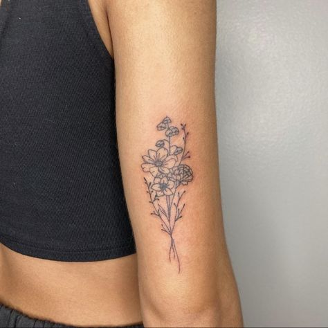 Different Flower Bouquet Tattoo, Back Of Arm Birth Flower Tattoo, Back Arm Flower Tattoo Women, Realism Flower Bouquet Tattoo, Flower On Bicep Tattoo, Woman’s Bicep Tattoo, Flowers On Inner Arm Tattoo, Floral Tattoo On Back Of Arm, Women Bicep Tattoo Simple