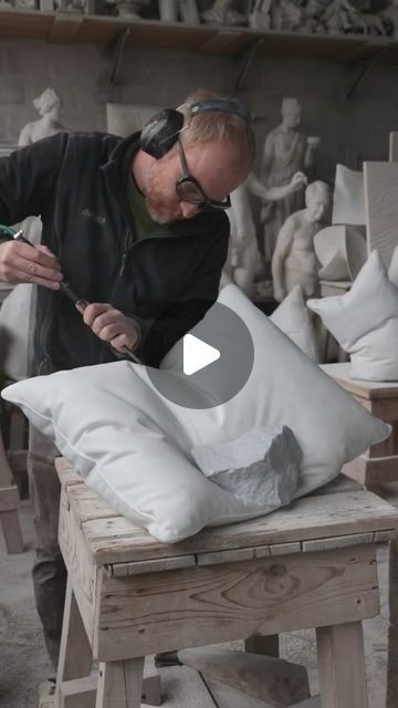 Architecture & Design on Instagram: "Norwegian sculptor Håkon Anton Fagerås (@fageras_sculpture), shapes marble blocks into large white pillows using a pneumatic hammer and other carving tools. The pillows, slumped in natural poses, feature smooth folds and wrinkles that defy the properties of the medium.

In an interview, Fagerås said marble is great for showing emotions because it looks fragile due to its qualities, but it’s actually quite strong. He aims to create feelings and atmosphere rather than just literal representations of fragility. #architectanddesign

•
#art #design #marble #sculpture #pillow #carving #artwork #artist" Showing Emotions, Natural Poses, Cultural Change, Marble Block, Slumping, Marble Sculpture, Carving Tools, Sculpture Installation, White Pillows