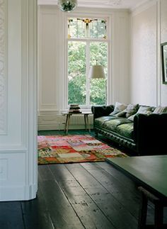 Black Floorboards, Black Wooden Floor, Edinburgh Flat, 1900 Farmhouse, Black Wood Floors, Minimal Homes, Painted Floorboards, Painted Wood Floors, Green Apartment