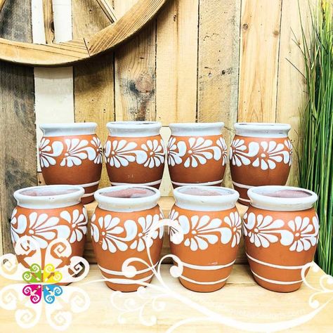 Set of 8 cantaritos.  Great for decoration or safe to drink your favorite Mix drink. Handcrafted by talented artisans from Guanajuato, Mexico, using traditional techniques. Great item to be used as small vase! get your favorite flowers to decorate your home or office. Holds 16 oz Tall: 5 in We highly recommend handwashing and not to use microwave to protect enamel and paintings. Wedding Cantaritos, Diy Cantaritos, Mexican Vases Pottery, Mexican Vases With Flowers, Cantarito Centerpiece, Cantaritos Decoration, Mexican Centerpiece Ideas, Charro Theme Party, Mexican Centerpiece