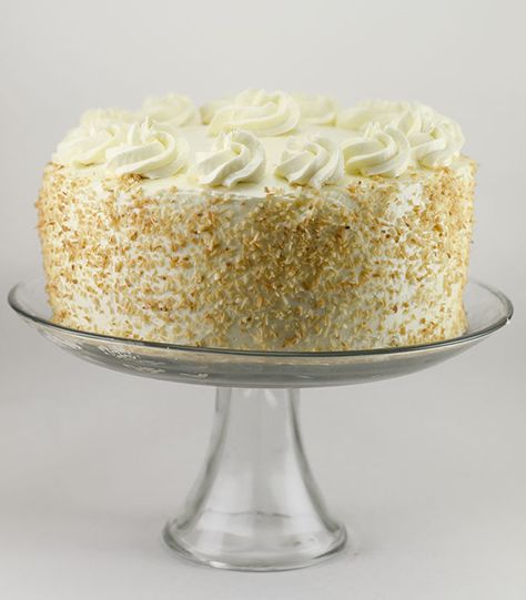 Coconut Layer Cake with Coconut Swiss Meringue Buttercream | The Cake Merchant Coconut Layer Cake, Swiss Buttercream, Cake With Coconut, Light Cakes, Cake Day, Meringue Buttercream, Swiss Meringue Buttercream, Swiss Meringue, Decadent Cakes