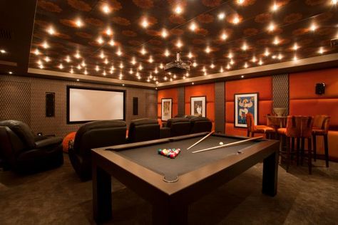 Warm, Inviting Home Theater and Game Room | HGTV Games Room Ideas, Garage Games, Garage Game Rooms, Basement Home Theater, Basement Lighting, Basement Ceiling, Home Theater Rooms, Orange Walls, Theatre Room