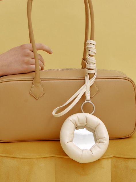 KOIMOOI is a contemporary brand that expresses our shared silhouette of this era in the most me-like way, respecting diversity. - Mirror bag charm with a long strap- Plump padded donut frame- Mini storage slot at the back- Casual and unique mood <form class=stretch mx-2 flex flex-row gap-3 last:mb-2 md:mx-4 md:last:mb-6 lg:mx-auto lg:max-w-2xl xl:max-w-3xl> </form> Innovative Accessories, Mirror Bag, The Row Bag, Mini Mirror, 3d Printing Fashion, Padded Bag, Pad Bag, Mini Storage, Gelang Manik