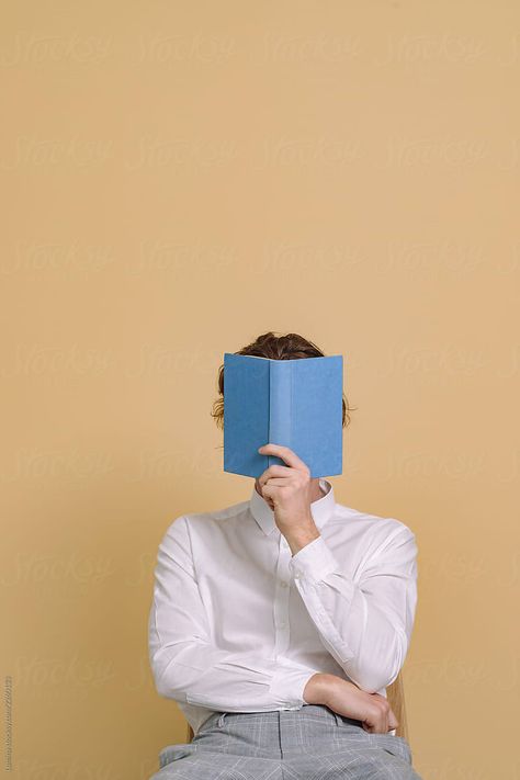 Person With Book Reference, Person Reading Reference, Poses With Books Photo Ideas, Holding Book Pose Reference, Person Holding Book, A Person Reading A Book, Pose With Book, Reading Book Pose, Reading Book Photography