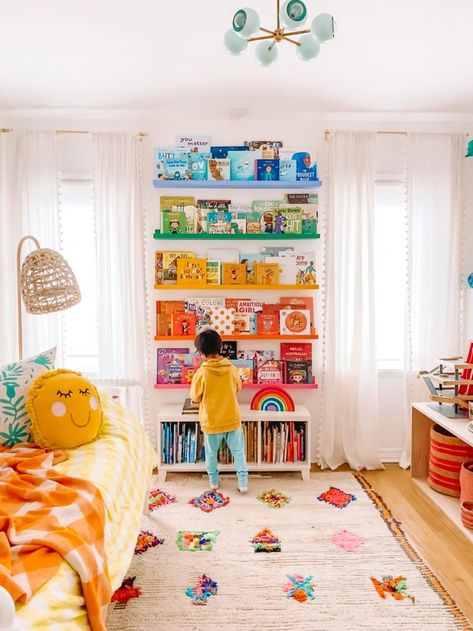 IKEA Hack: DIY Rainbow Bookshelves | studiodiy.com Toddler Girls Room Colorful, Colorful Toy Room, Bright Rainbow Nursery, Modern Eclectic Nursery, Toddler Room Ideas Girl Colorful, Colorful Kids Playroom, Colorful Baby Room Ideas, Kids Room Colorful, Nursery Room Inspiration Colorful