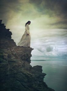 Mark Owen WOMAN STANDING ON CLIFF EDGE BY SEA Falling Off A Cliff, Cliff Edge, Mark Owen, The Encounter, A Level Art, Woman Standing, Cover Art, Antonio Mora Artwork, Art Reference