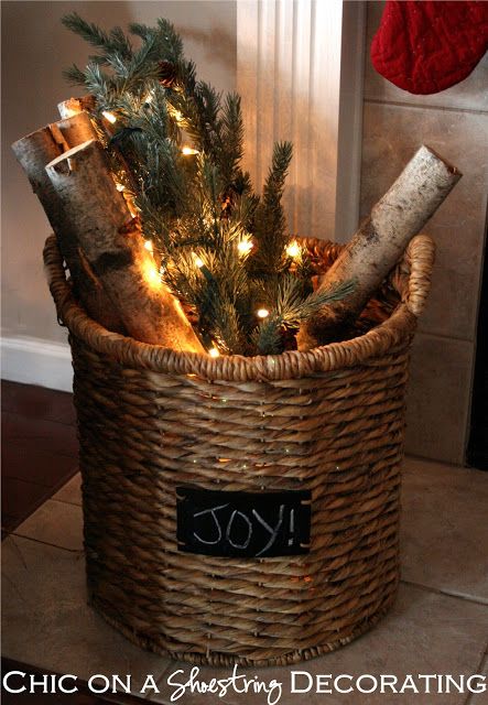 Rustic Christmas...in a basket.  Put some birch branches in a large basket along with some lighted pine pieces for a softly glowing Christmas look.  Add a "Joy" or other sign to the front of the basket for a prim touch. Outdoor Holiday Planters, Rustic Christmas Mantel, Holiday Planter, Diy Jul, Porch Christmas, Diy Pots, God Jul, Christmas Mantels, Christmas Decorations Rustic