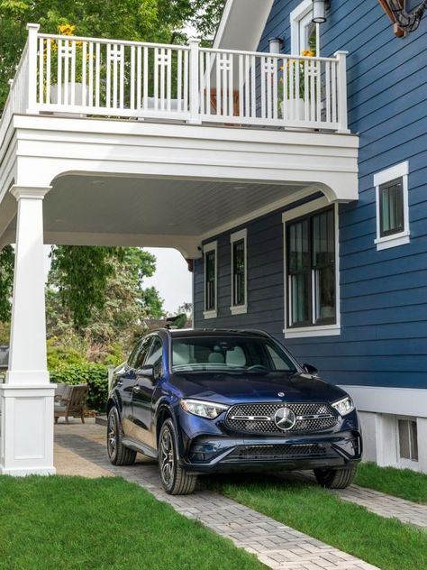 The porte-cochère style carport is the perfect spot to park the new car that the winner of HGTV Urban Oasis 2023 will also bring home. Carport Addition, Southern Nights, Geometric Side Table, Kentucky Home, British Colonial Decor, Deck Pictures, Wood Island, Carport Designs, Porte Cochere