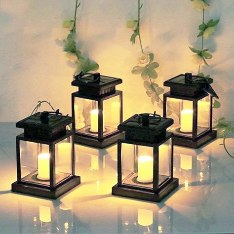 Neo Glim Solar Flameless Candle Lantern 4-pack on the table Solar Candles, Patio Lanterns, Solar Hanging Lanterns, Hanging Solar Lights, Solar Landscape Lighting, Solar Landscape, Solar Lantern, Outdoor Candles, Light Hanging