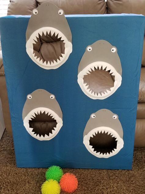 Shark Attack Spikey Ball Toss - ocean themed carnival Game made with paper plate shark jaws Paper Plate Shark, Snow Travel, Shark Themed Party, Cold Christmas, Ocean Birthday Party, Shark Themed Birthday Party, Shark Jaws, Ocean Birthday, Christmas Landscape