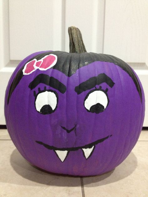 Cute vampire painted pumpkin. Vampire Painted Pumpkin, Dracula Pumpkin Painted, Purple Pumpkin Ideas, Halloween Pumpkins Painted Easy, Purple Painted Pumpkins, Purple Pumpkin Painting Ideas, Vampire Pumpkin Painting, Kids Painted Pumpkins, Dracula Pumpkin