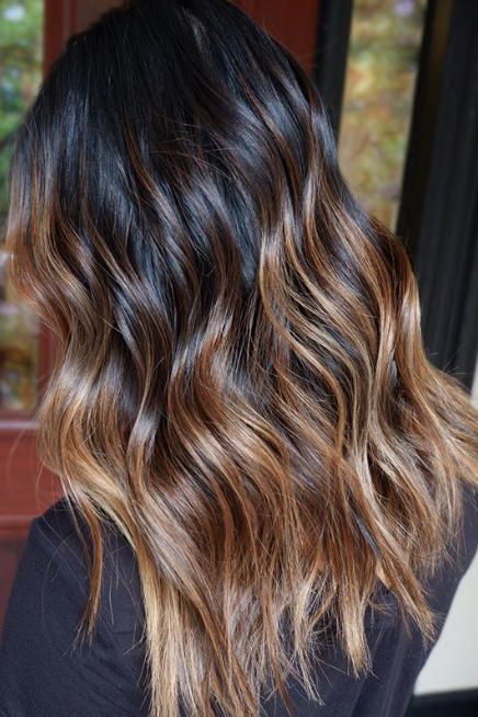 15 Stunning Examples of Melted Caramel Hair To Bring to Your Colorist This Fall | Like a dollop of cream into a dark roast espresso, this color is what every mocha-hued brunette needs to have her mane warmed-up and fall-ready. #southernliving #haircolor #hairstyle Brown Hair With Toffee Balayage, Dark Roots Caramel Ends, Root Melt Brunette To Copper, Root Melt Caramel Balayage, Caramel Balayage By Hair Pattern, Dark Hair Melt, Caramel Machiatto Hair, Rooted Caramel Balayage, Color Melt Dark Hair