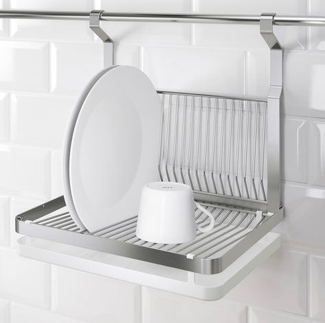 GRUNDTAL Dish Drainer      $26.99  This dish drainer is compatible with IKEA's GRUNDTAL rail system, so it can hang on the wall, drying dishes without taking up any countertop real estate at all — and then fold up when not in use. Small Apartment Kitchen, Dish Drainers, Tidy Kitchen, Compact Kitchen, Dish Rack, Kitchen Helper, Dish Rack Drying, Rack Design, Dish Racks