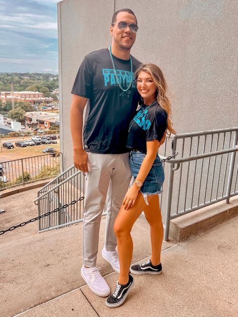 Panthers football game outfits! 🏈 Both tee shirts are from Amazon and so comfy! His is dri-fit material and perfect for a day in the sun. His pants and shoes are BYLT (couldn’t link). And of course my trusty Vans! Follow my shop @Amberxnicoleee on the @shop.LTK app to shop this post and get my exclusive app-only content! #liketkit #LTKunder50 #LTKmens #LTKSeasonal @shop.ltk https://liketk.it/3QhPX Football Game Outfits, Panthers Football, Football Game Outfit, Football Game, Gaming Clothes, Football Games, Dri Fit, The Sun, I Shop