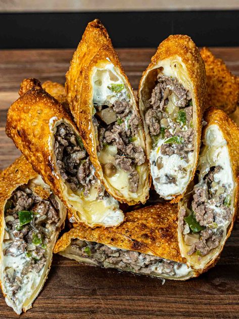 Philly Cheesesteak Egg Rolls Philly Cheesestake Egg Rolls, Chicken Philly Cheesesteak Eggrolls, Philly Cheese Steak Roll Ups, Puff Pastry Egg Rolls, Philly Cheesecake Eggrolls, Cheese Steak Egg Rolls Air Fryer, Egg Rolls Filled With Philly Cheesesteak, Philly Cheese Crunchers, Philly Steak Egg Rolls Recipe