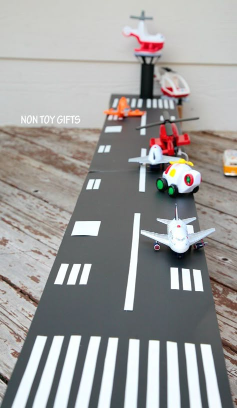 Now this is fun thing to make for the kiddos who like to play airport. I think it’s a great to show kids that they can make things they want to use in their playtime. Fly on over to the link … Cardboard Airport, Cardboard Kids, Airport Ideas, Craft Cardboard, Diy Cardboard Toys, Airplane Crafts, Airplane Birthday Party, Block Play, Non Toy Gifts