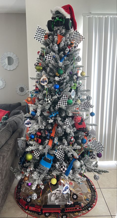 Construction Theme Christmas Tree Ideas, Cars Theme Christmas Tree, Hot Wheel Christmas Tree, Race Car Christmas Tree Ideas, Nascar Christmas Tree, Monster Jam Christmas Tree, Hotwheels Christmas Tree Ideas, Little Boys Christmas Tree, Car Themed Christmas Tree