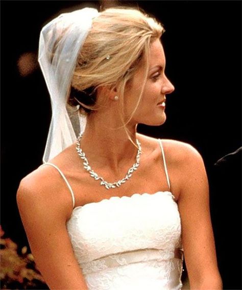 Veil Bun + Hair Jewels: Okay, so we know J.Lo was the real star of 2001's The Wedding Planner, but rival Fran's bridal look was just too good to ignore. Veil In Bun, Bridal Hair Updo Veil, Wedding Updo Veil, Updo Hairstyles With Veil, Bun And Veil, Updo With Veil, Bun Veil, Bun With Veil, Wedding Updo With Veil