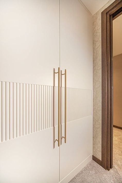 Textured Cupboard Doors, Fluted Mica Wardrobe, Fluted Cupboard Doors, Master Bedrooms Wardrobes Design, Sliding Wardrobe Shutter Design, White And Gold Wardrobe, Fluted Wardrobe Doors, Fluted Laminate Wardrobe, Fluted Wardrobe