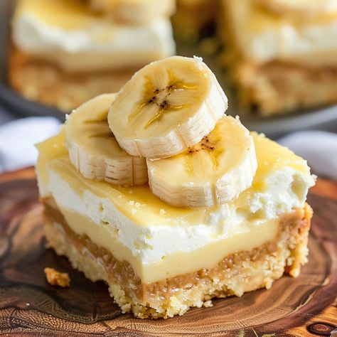 Banana Cheesecake Bars, Banana Pudding Cheesecake Bars, Vanilla Wafer Crust, Banana Cream Pudding, Pudding Cheesecake, Vanilla Wafer, Pudding Flavors, Banana Pudding Cheesecake, Dream Bars