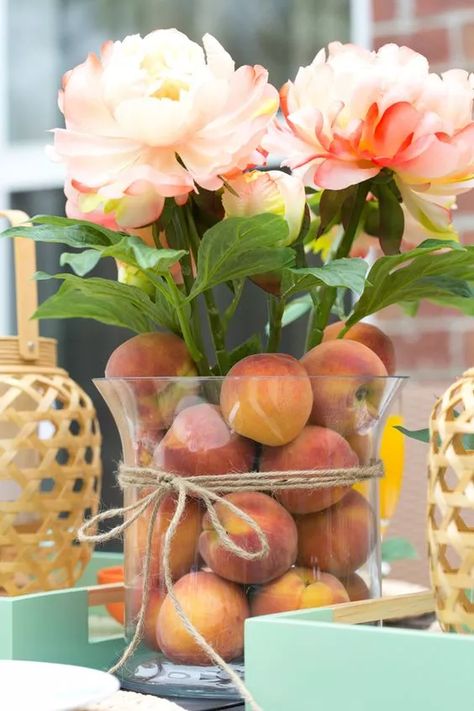 18  Amazing Peach Themed Baby Shower Ideas (  Free Invitation) One Sweet Peach Table Centerpieces, Peach Table Centerpieces, One Sweet Peach Birthday Party Diy, Peach Floral Centerpieces, Sage And Peach Wedding Centerpieces, Decorating With Peaches, Peach Theme Party Favors, Peach Color Party Decorations, Peach Themed Kitchen