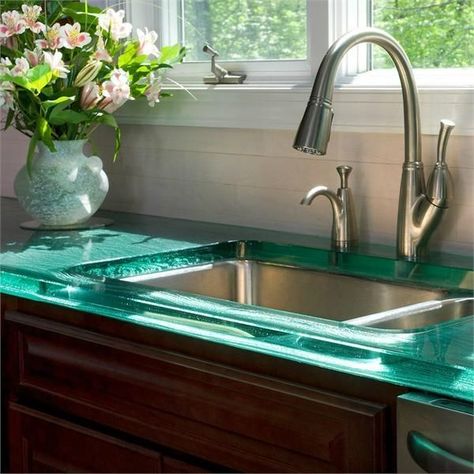 10 Most Popular Kitchen Countertops Counter Quartz, Popular Kitchen Countertops, Glass Kitchen Countertops, Modern Kitchen Countertops, Recycled Glass Countertops, Glass Countertop, Kitchen Top, Glass Countertops, Cabinets And Countertops