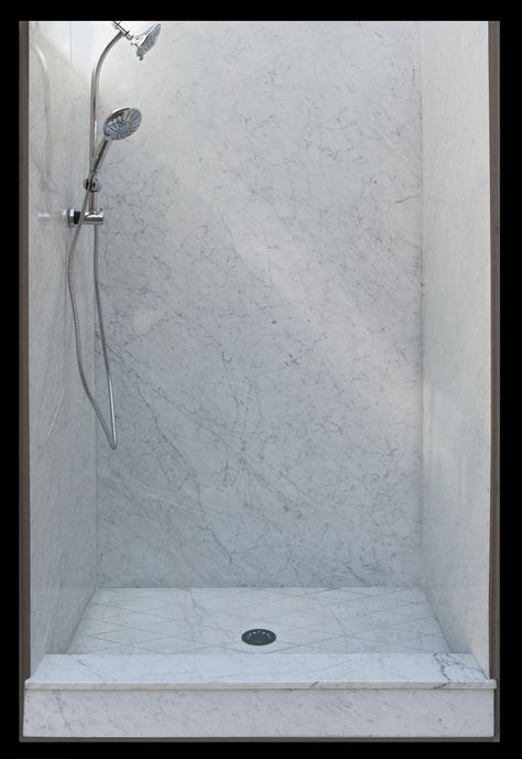 Tired of cleaning your grout lines? Try a grout less natural marble shower surround! Visit us at www.stoneplyresidential.com Groutless Shower Walls, Remodel Shower Stall, Cultured Marble Shower Walls, Cultured Marble Shower, Marble Shower Walls, Bathroom Shower Panels, New House Bathroom, Marble Showers, Shower Walls