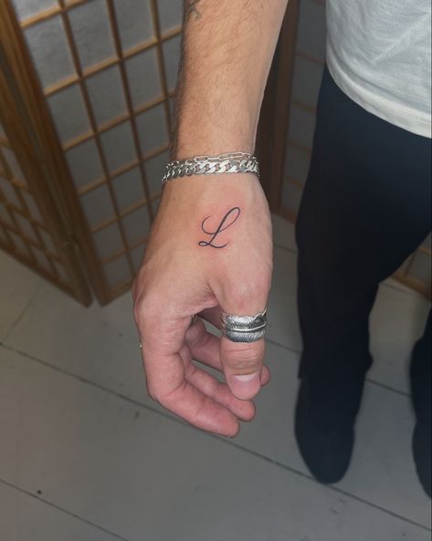 Intial hand tattoo in calligraphy His Initials Tattoo, Mens Initial Tattoo, Initial On Hand Tattoo, Name Tattoos On Men, Initial Tattoo Men, Initial Tattoo For Men, Letter Tattoo Men, Script Hand Tattoo, Cursive J