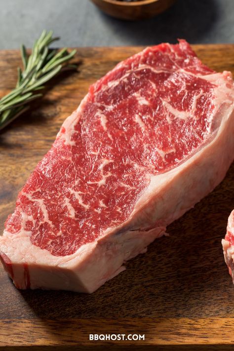 Confused about the difference between New York strip and ribeye steak? Discover the unique characteristics of each cut, from marbling to texture, and make an informed choice for your next ribeye steak recipes. Visit now to learn more about ribeye steak and new york strip steak! Save this post to prep your steak recipes! Steak Preparation, Marinade Ideas, Cuts Of Steak, Best Cut Of Steak, Grilling Steak, New York Strip Steak, Raw Beef, Ribeye Steak Recipes, Frozen Beef