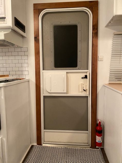 Trim Around Camper Door, Rv Door Frame Makeover, Painting Rv Window Frames, Rv Door Remodel, Rv Door Trim, Rv Door Makeover, Camper Door Makeover, Trailer House Remodel, Exterior Door Frame