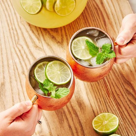 Moscow Mule Punch - Delish.com Big Batch Moscow Mule Recipe, Moscow Mule Batch Recipe, Big Batch Moscow Mule, Batch Moscow Mule, Moscow Mule Bar, Party Cocktail Ideas, Moscow Mule Punch, Vodka Mixed Drinks Recipes, Party Drink Ideas