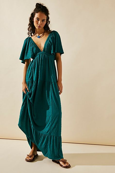 Forever free and flowy, this effortless maxi dress from our free-est collection is featured in a V-neck, tiered silhouette with flutter sleeves for added shape. * Soft, textured fabrication * Elastic empire waist * Effortless, pull-on style | La La Maxi Dress by free-est at Free People in Blue, Size: S Backless Summer Dress, Summer Maxi Dress Boho, Blue Boho Dress, Backless Dress Summer, Free People Maxi, Free People Maxi Dress, Dress Pleated, Empire Waist Dress, Maxi Robes