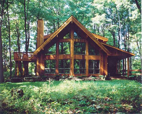 The Woodland house plan is a cottage with a prow roof. Over 1400 square feet with a covered porch and 2 bedrooms. Call Linwood Homes to learn more: 1-888-546-9663 A House In The Woods, Linwood Homes, Chalet House, Woodland House, Log Cabin Ideas, Log Cabin Homes, A Frame House, Hus Inspiration, Cabin In The Woods