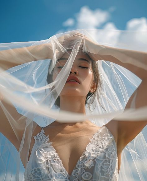 She lifted the veil, and the world around her paused, caught in the simplicity of her beauty. ✨ #VeilMoments #BridalElegance #UnderTheVeil #TimelessBride #WeddingDayMagic #QuietBeauty #RomanticGaze #SomethingBlue #BridalPortrait #foreverstartsnow #weddinginspo #bridetobe2025 #voguewedding #wedvibes Veil Editorial, Veil Photoshoot, Veil Photos, Under The Veil, White Veil, Floral Veil, White Veils, Gothic Cathedral, Vogue Wedding