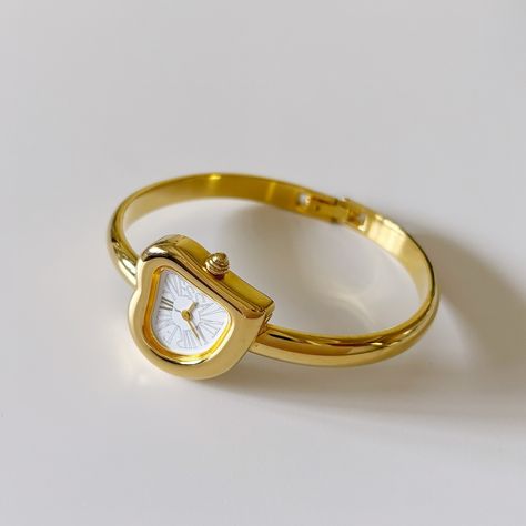 Yves Saint Laurent Heart Shaped Bangle watch from the 90s will be available at 5pm pacific time! Gold Bangle Watch, Bangle Watches, Watch Fashion, Jewelry Lookbook, Fancy Jewelry, Jewelry Inspo, The 90s, Gold Bangles, Cute Jewelry