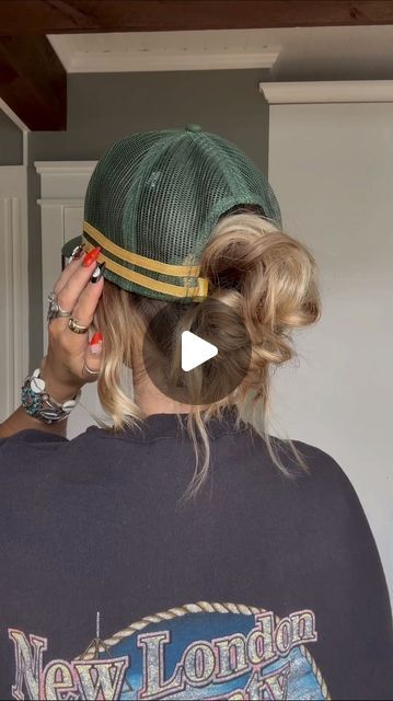 TORIE BLISS on Instagram: "My viral messy bun but with a hat 💚✨" How To Style A Ball Cap Women, Messy Hat Hairstyles, Messy Bun With Hat Tutorial, Hat And Bun Hairstyle, Hair In Baseball Cap, Bun With Hat Baseball Caps, Messy Bun Hat Hairstyles, How To Wear Caps Women, Updos With Hats